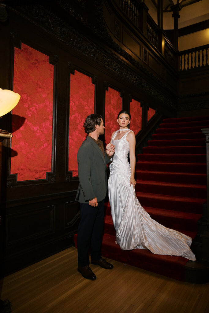 historic estate wedding, bride and groom on steps of the Cotton Mansion in Minnesota
