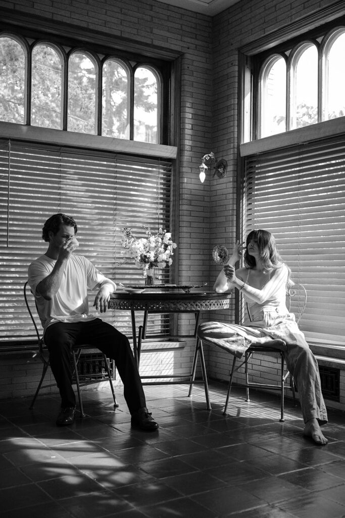 bride and groom at historic estate in Minnesota getting ready together