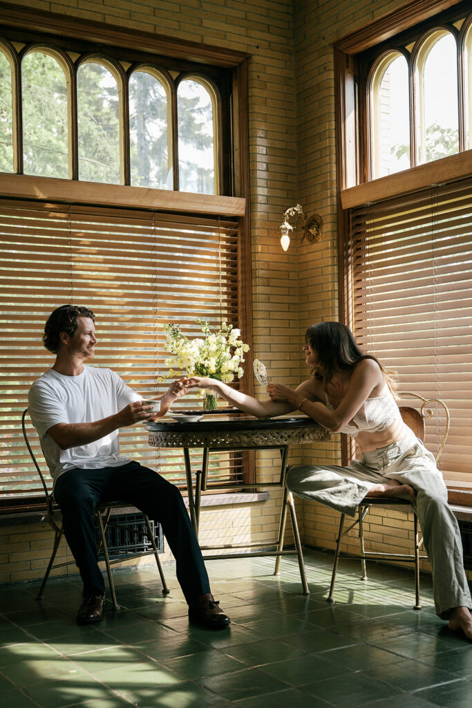 bride and groom at historic estate in Minnesota getting ready together