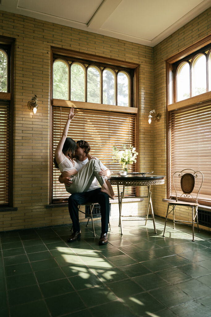 bride and groom at historic estate in Minnesota getting ready together