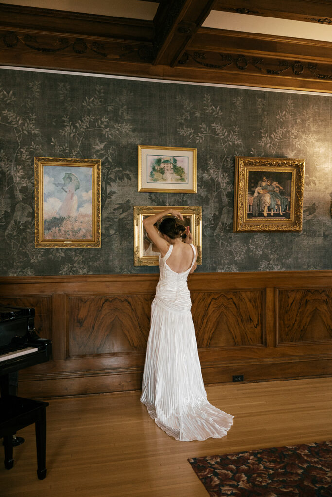 bride getting ready in historic mansion, estate wedding in Minnesota