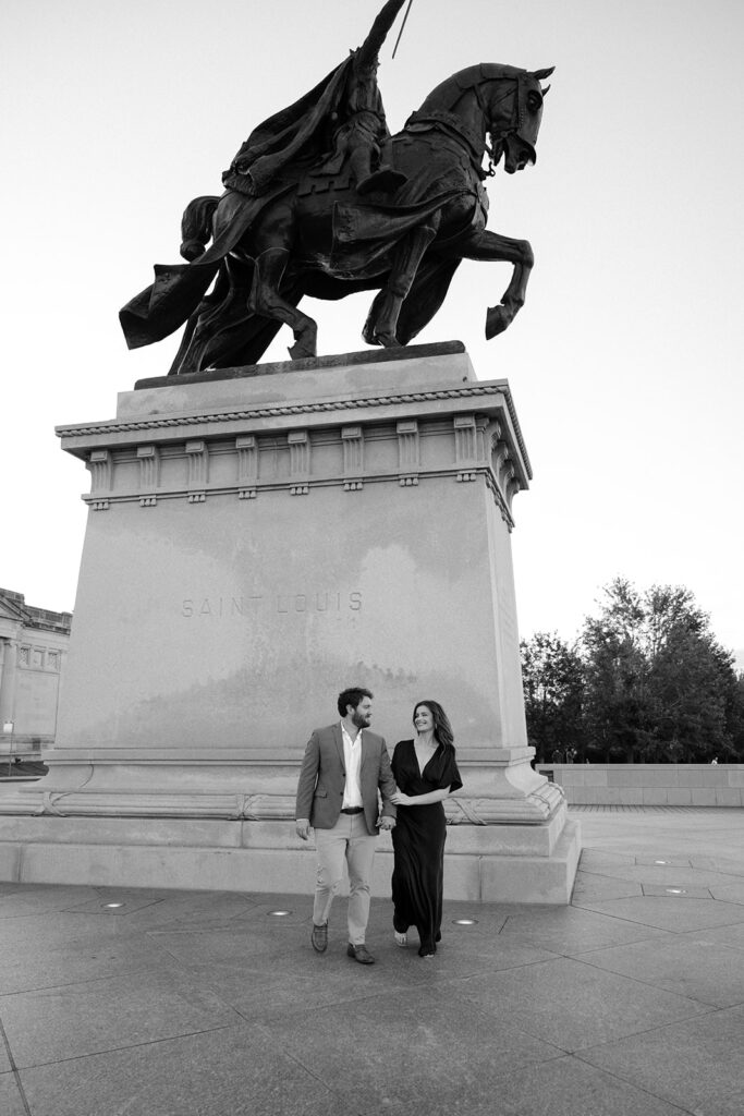 St. Louis Art Museum engagement session in Forest Park with couple walking hand in hand