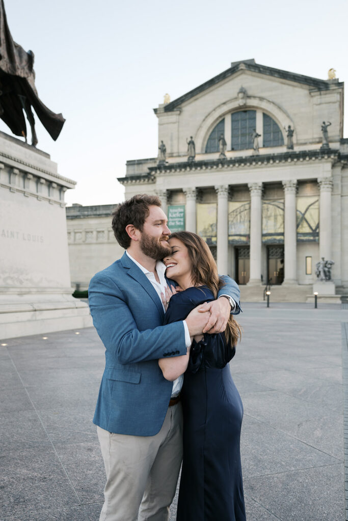 Candid St. Louis engagement photos outside Art Museum with natural movement and editorial style