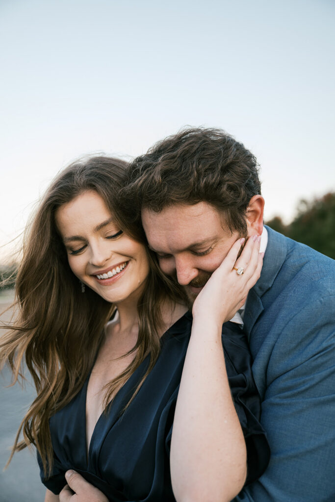 Candid St. Louis engagement photos outside Art Museum with natural movement and editorial style