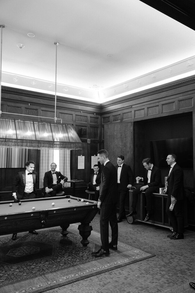 groomsmen hanging out while getting ready at the 21c museum hotel st. louis