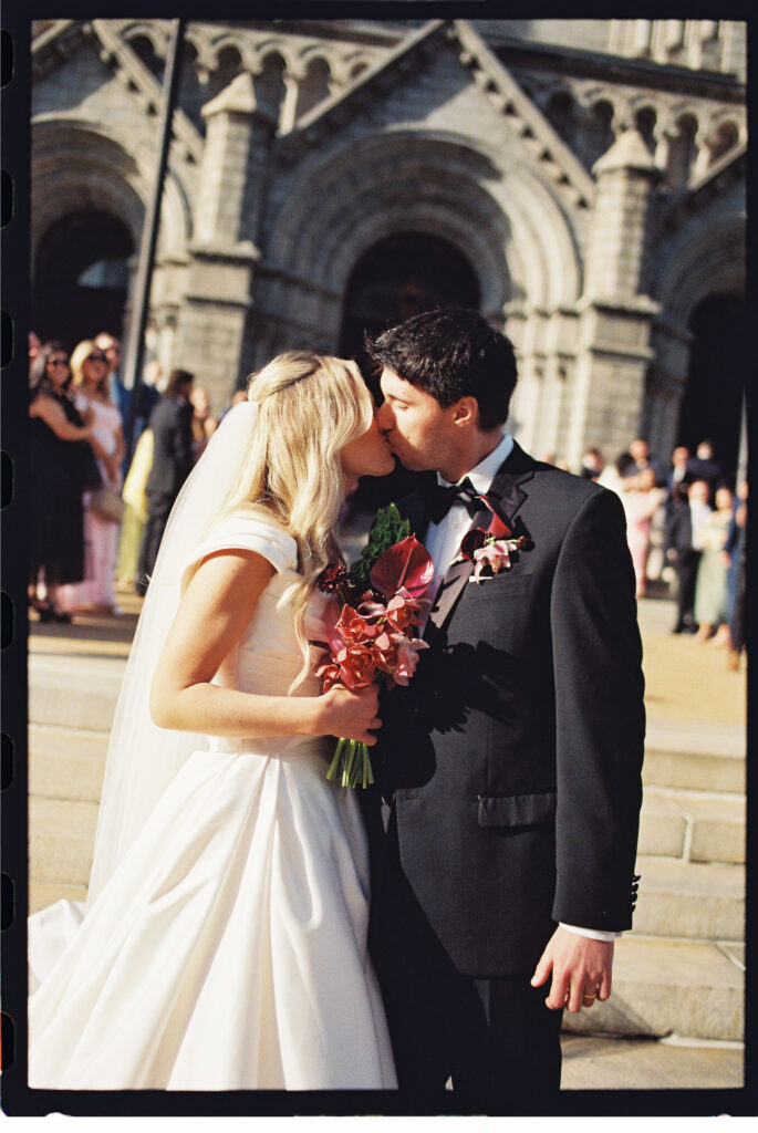 spring wedding in st. louis at Cathedral Basilica on film, bride and groom outside church